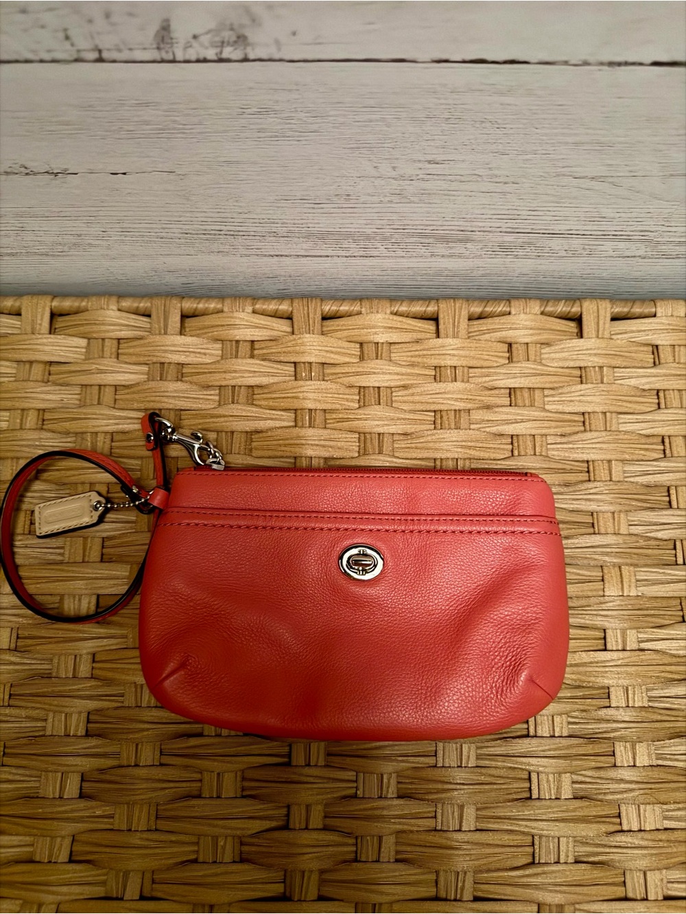 Coach Coral Leather Turnlock Wristlet